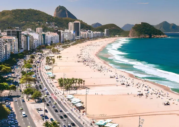 Vista panorâmica da Praia de COPACABANA, mais CESTA DE CAFÉ DA MANHÃ Especial, mais ESPUMANTE de Boas Vindas, a combinação perfeita para transformar sua hospedagem em uma experiência única e inesquecível Rio de Janeiro